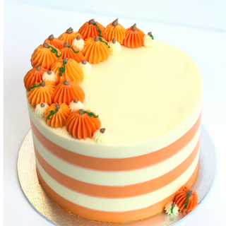 Learn how to make a Gorgeous Pumpkin Inspired Cake at home. Just in time for Halloween!